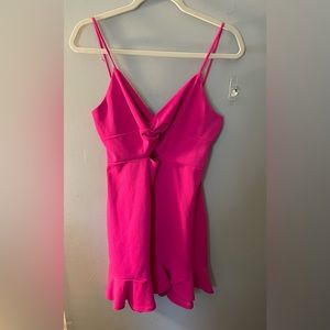 Hot pink body con mini dress with ruffle bottom - size L